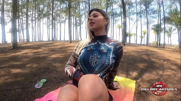 Very daring naughty blonde on the beach playing with her horny swollen pink pussy!